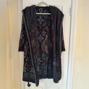 Embroidered cardigan…can be worn as a sweater jacket. Black with multi colors.